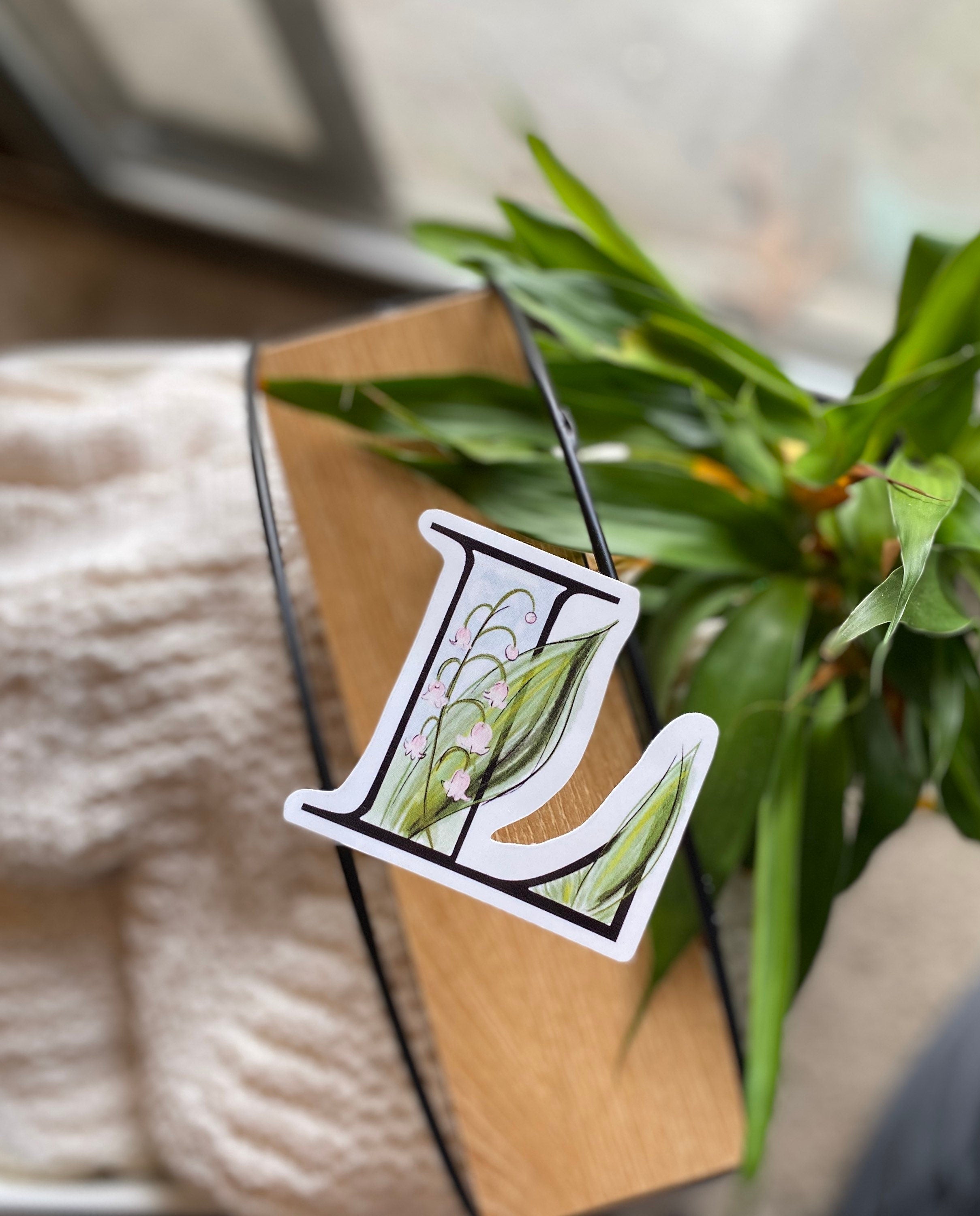 L is for lily of the valley Sticker