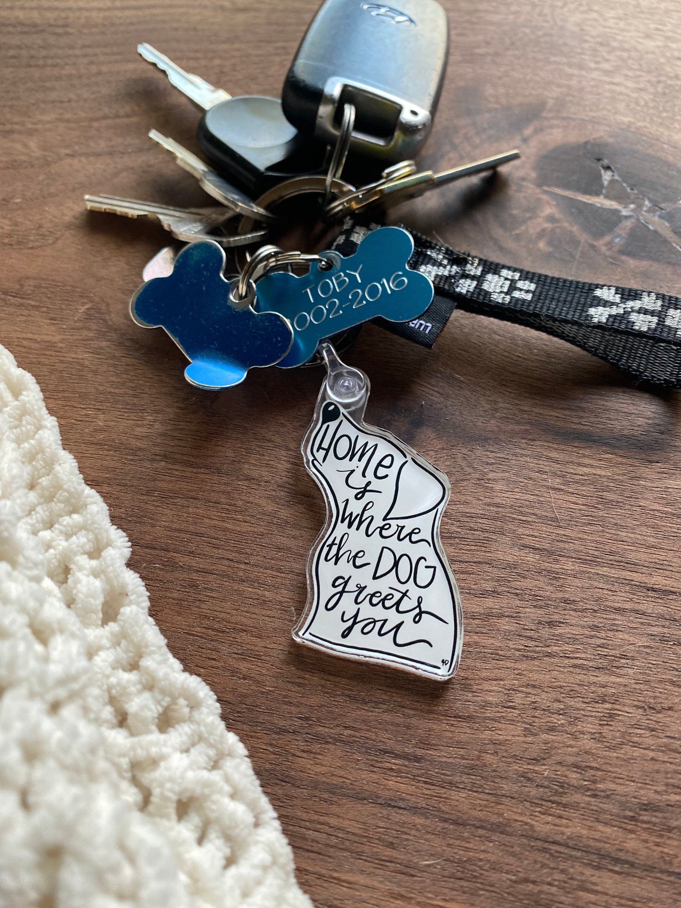 home is where the dog greets you acrylic keychain