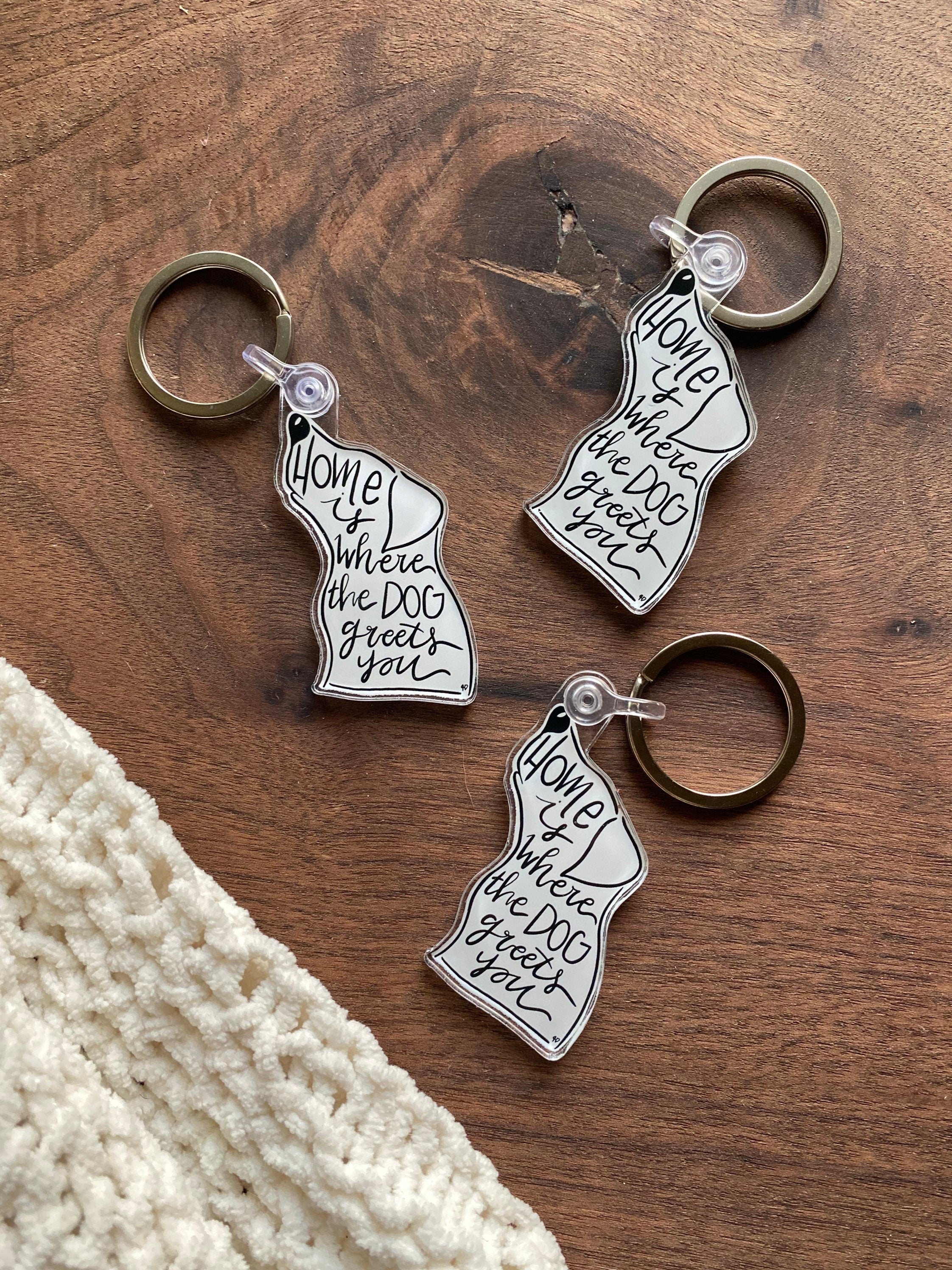 home is where the dog greets you acrylic keychain