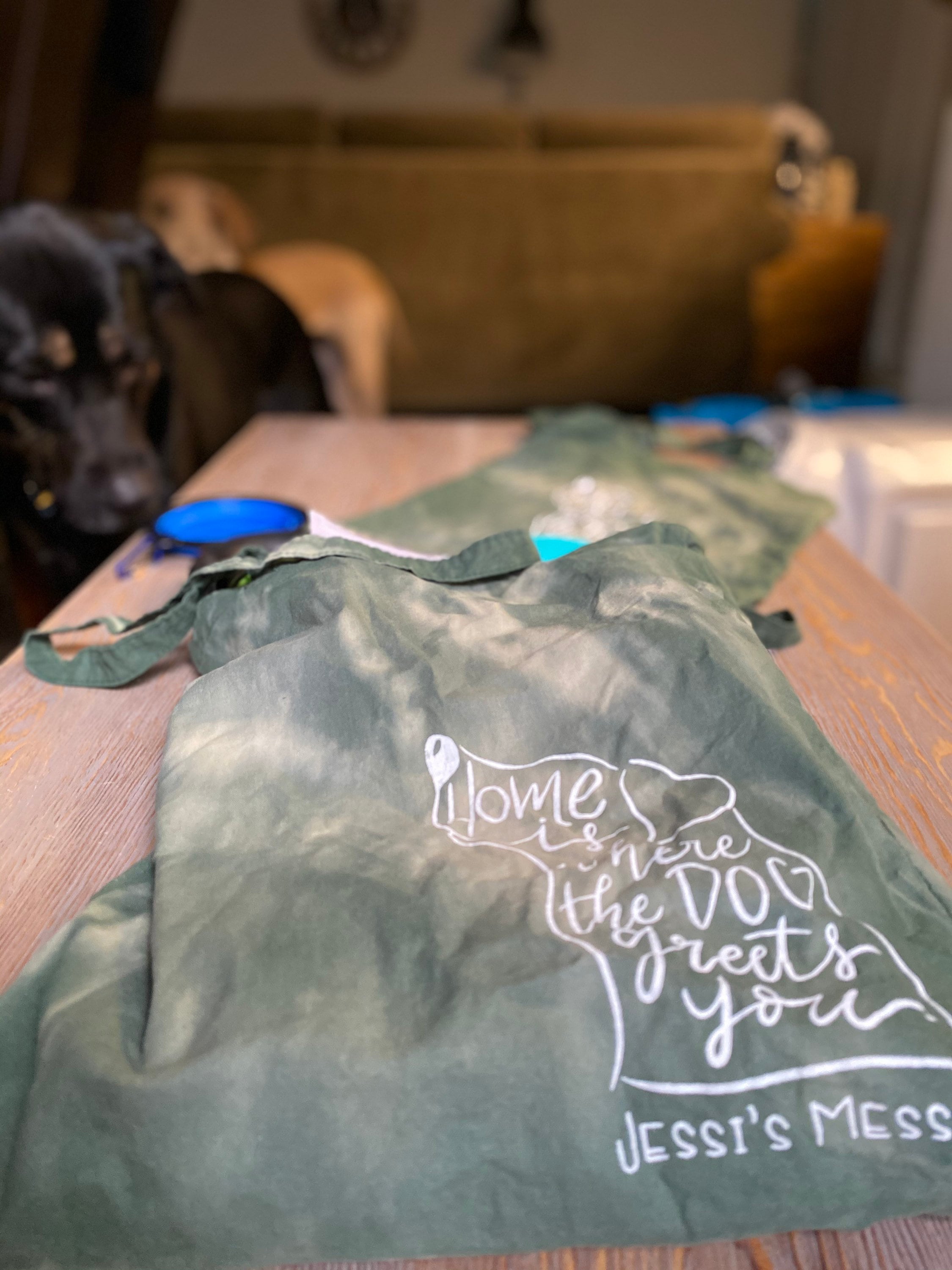 Home is where the dog greets you tote bag
