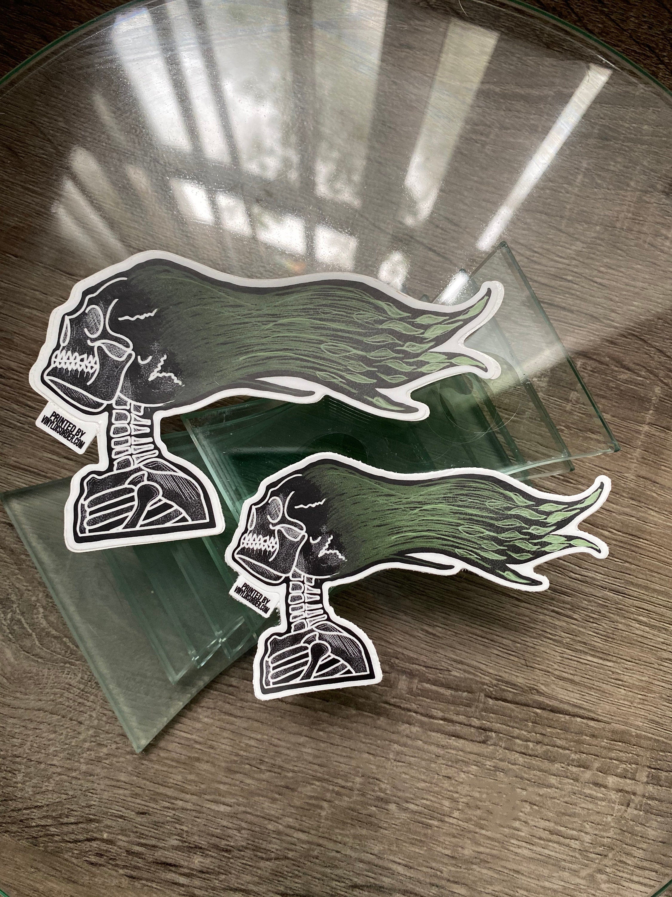 Green Haired Windblown Skull Sticker