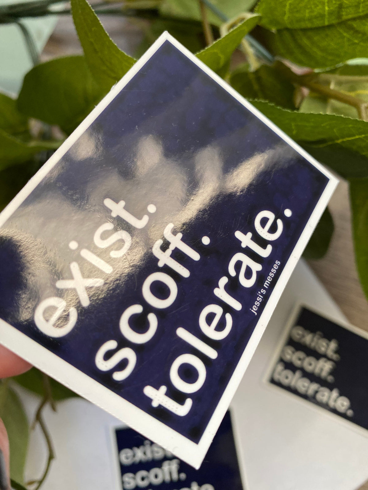 anti live laugh love, exist scoff tolerate sticker