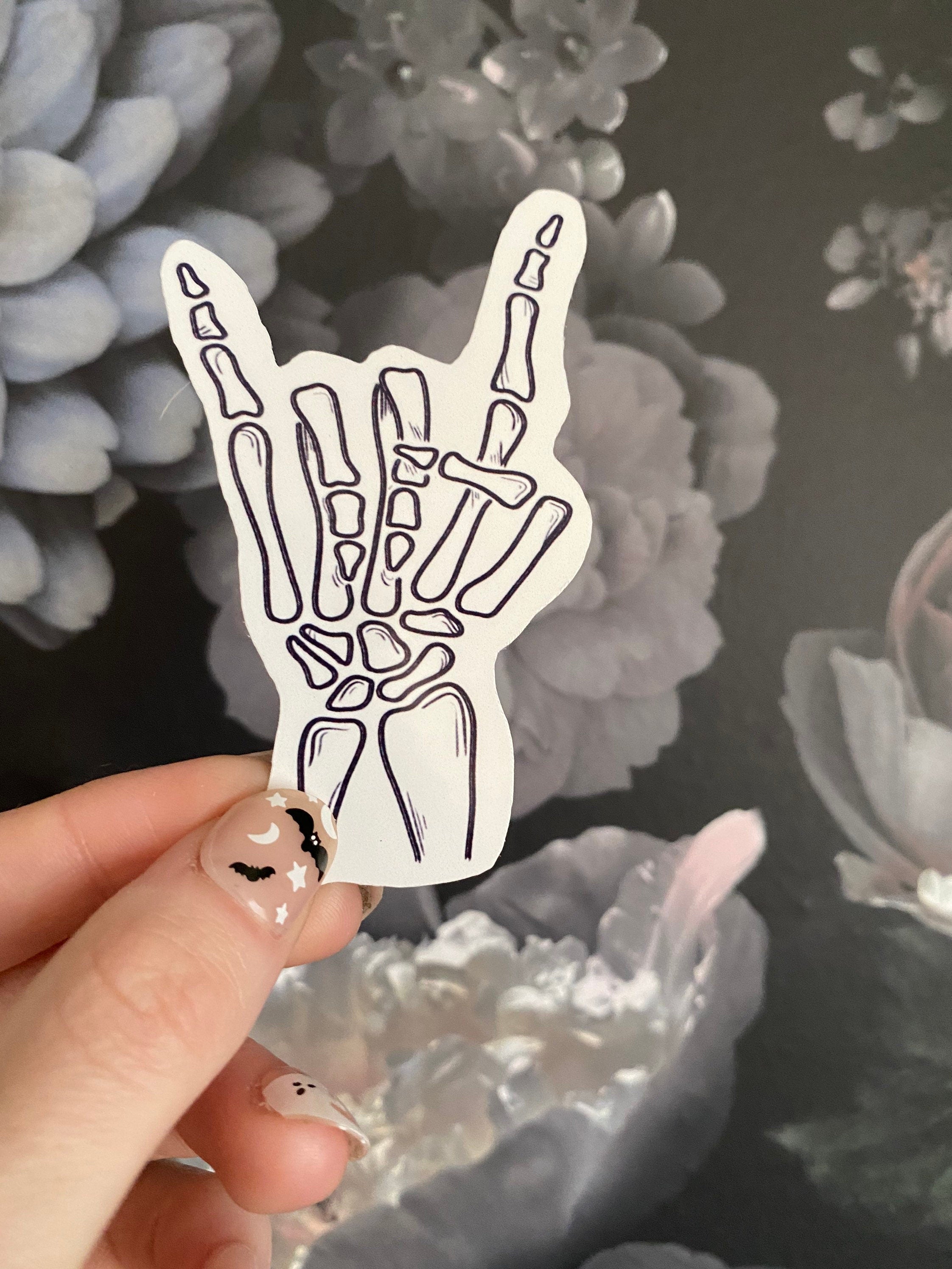 skeleton rock on hand vinyl sticker