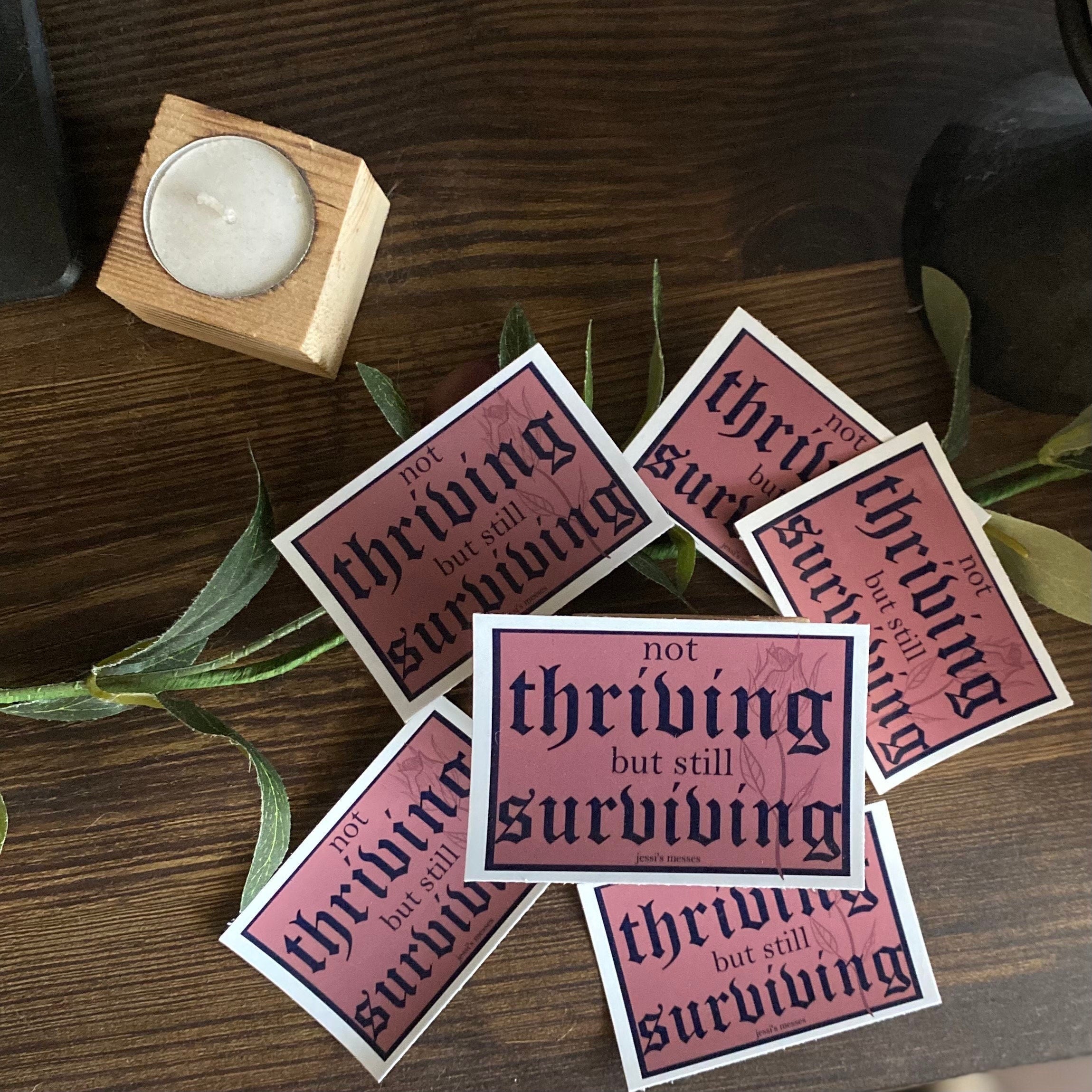 not thriving but still surviving sticker